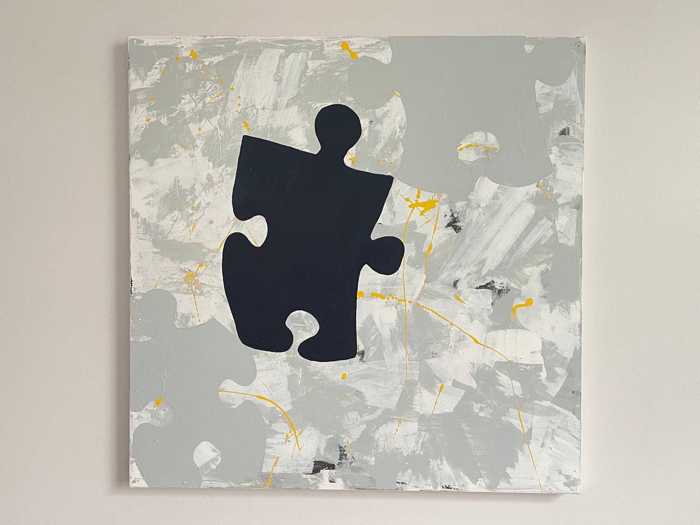 Black and Grey Puzzle Piece Painting